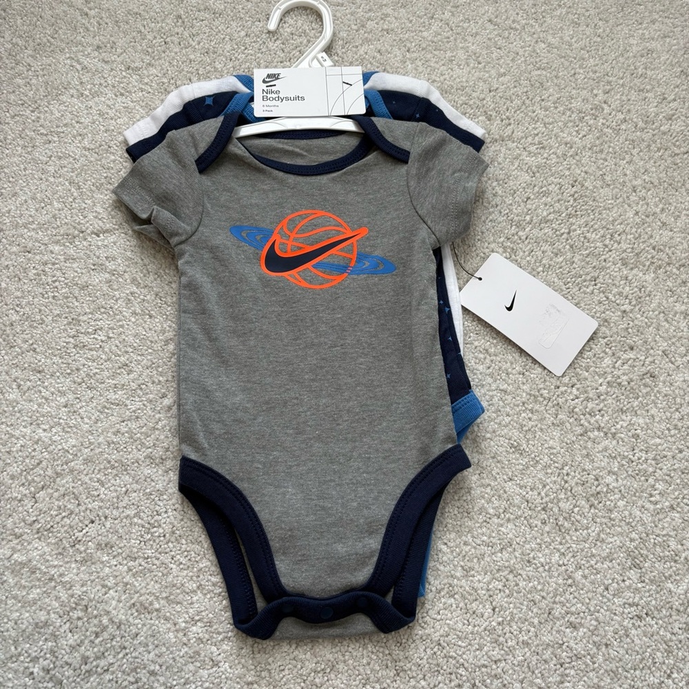NWT- NIKE bodysuits 6m